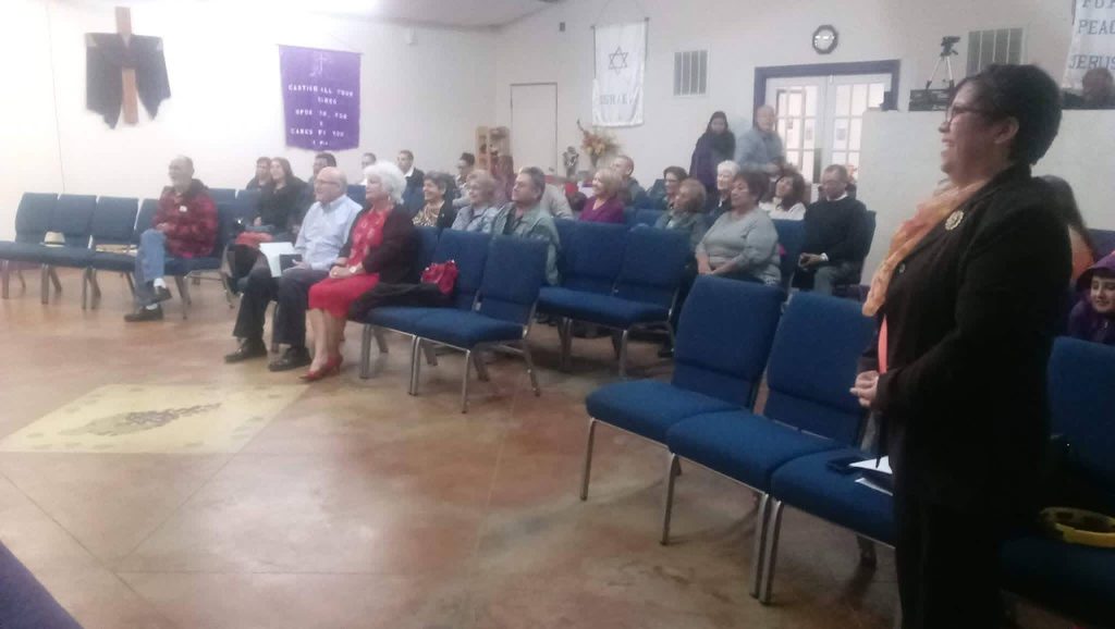 The congregation gathered together for a service at Glory of Faith Church