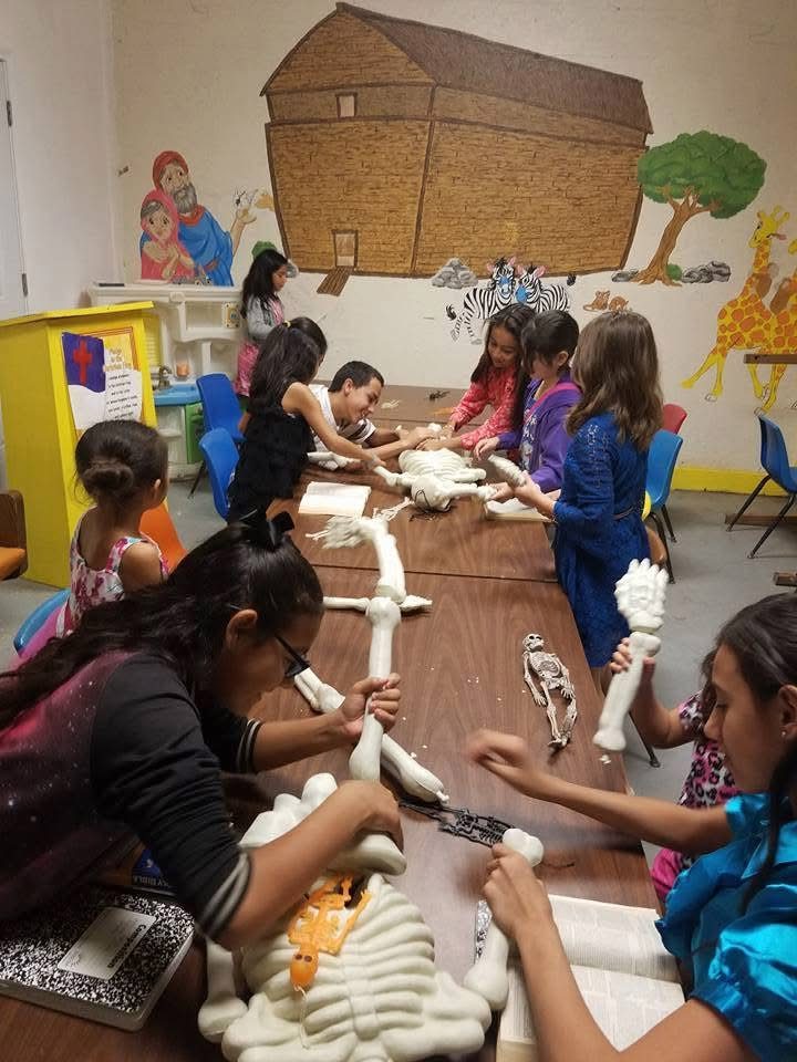 Children working on a craft together during Children&rsquo;s Church