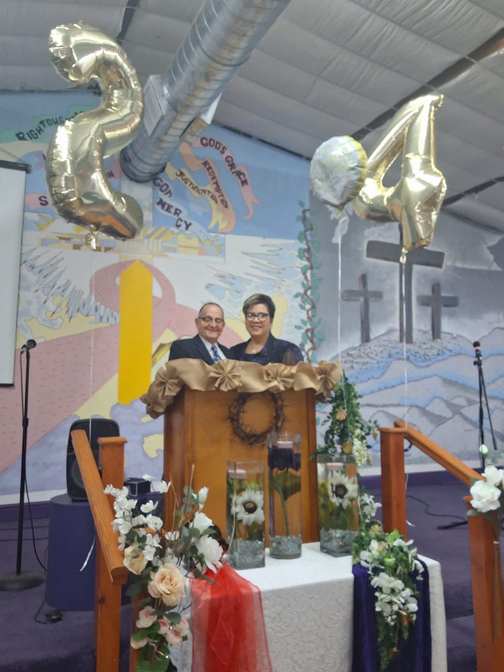 Pastors Alejandra and Roberto Valadez at a Glory of Faith Church anniversary service